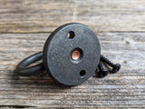 Hand forged wall hook recessed rivet in back plate detail